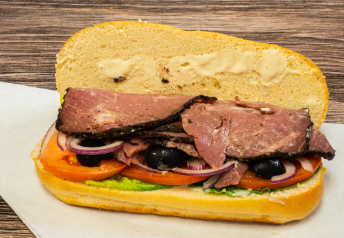 Large Roast Beef and vegetable sub sandwich prepared for catering orders.